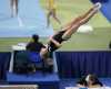 Svetlana Khorkina beam signature twist dismount off side - 2004 Athens Summer Olympics