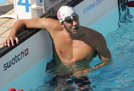 Michael Phelps looking at score board at end of swim meet - Athens Olympics